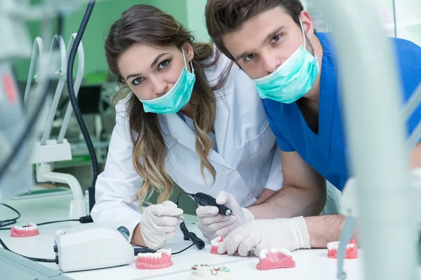 Dental prosthesis working on the denture — Stock Photo, Image