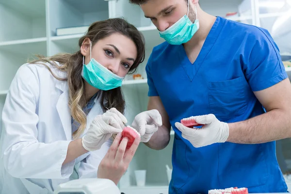 Dental prosthesis working on the denture — Stockfoto