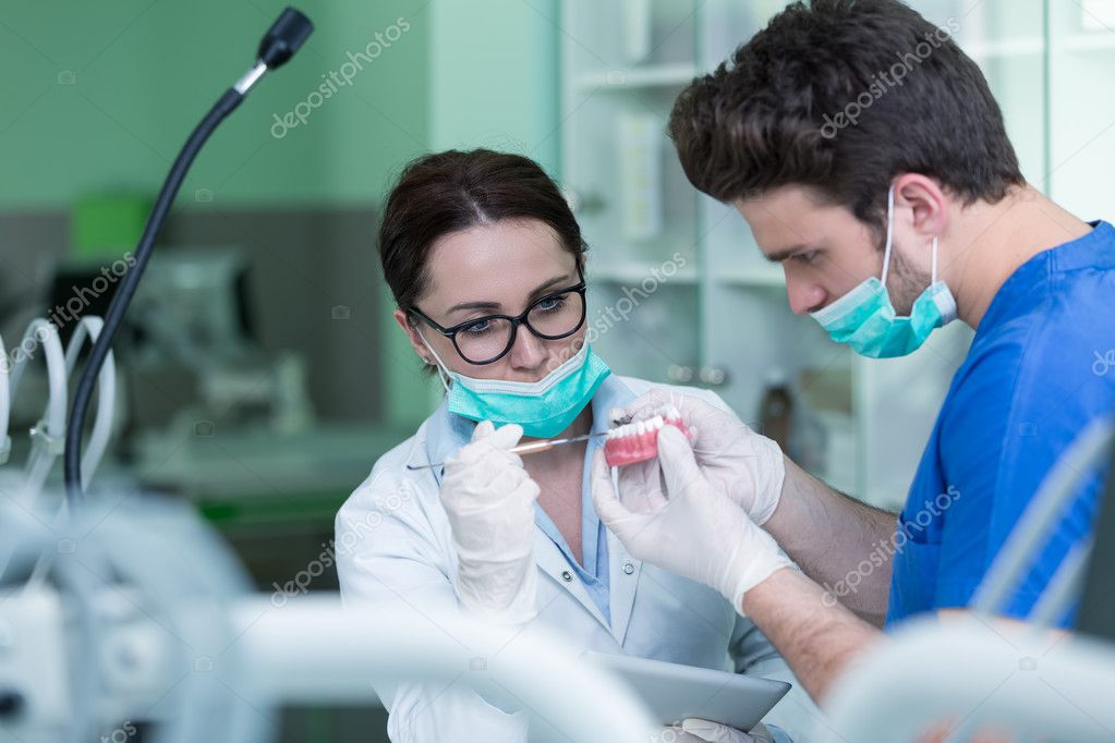 Dental prosthesis working on the denture — Stock Photo © FSStock