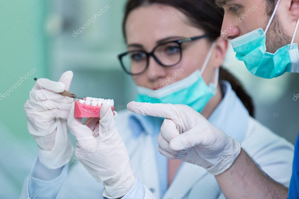 Dental prosthesis working on the denture — Stock Photo © FSStock
