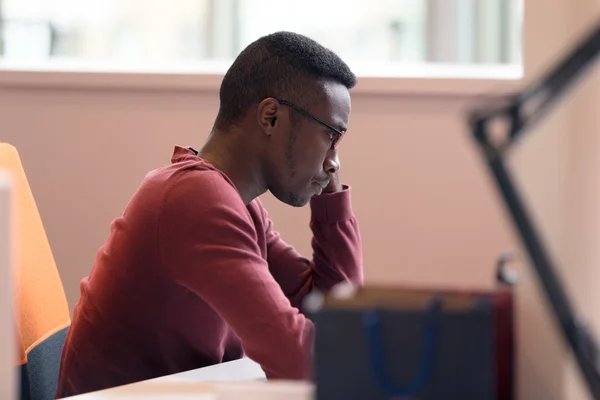 Handsome African American man looking at screen — Φωτογραφία Αρχείου