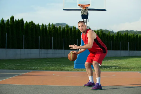 Portrait of young man street basket player