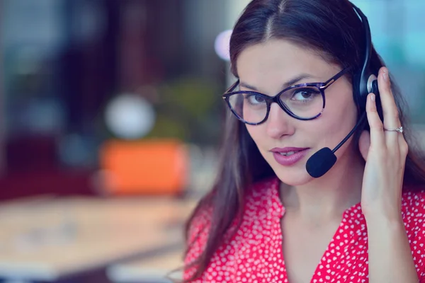 Young woman working in call centre — Stock Photo, Image