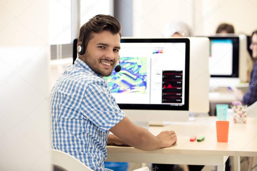 Man Working At computer Desk