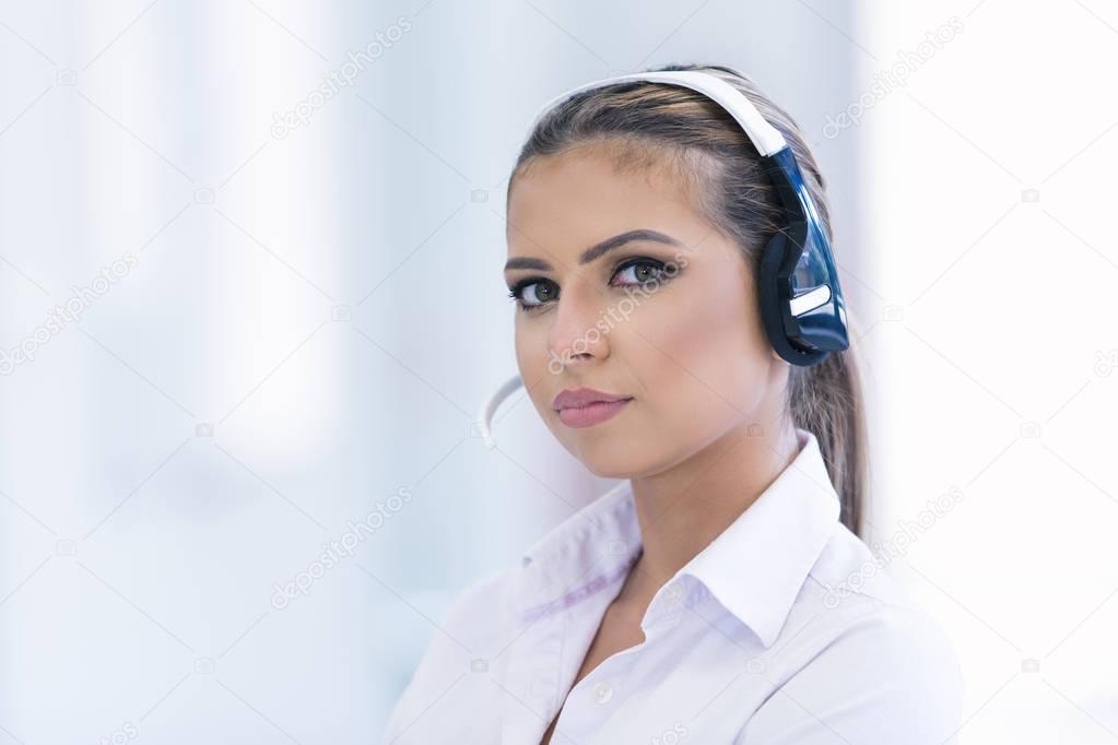 Female support operator with headset