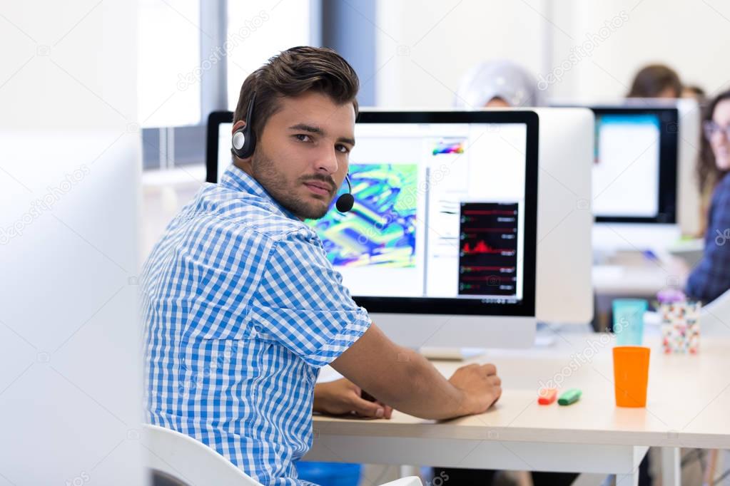 Man Working At computer Desk