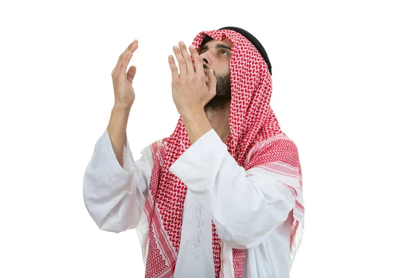 Unga arabiska man be — Stockfoto