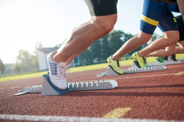 People ready to race on track field — Stock Photo, Image