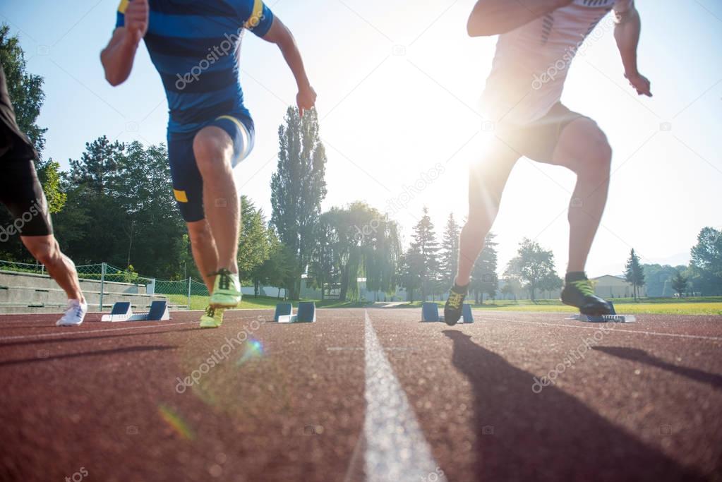 People ready to race on track field