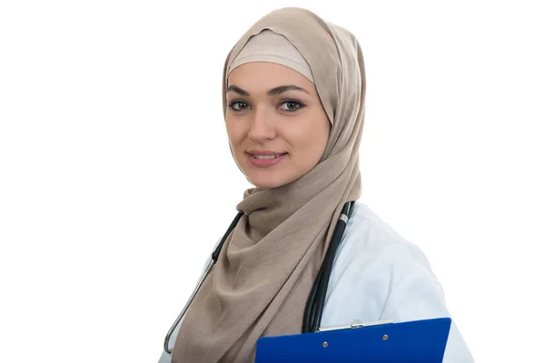 Confident muslim female doctor holding folder. Stock Picture