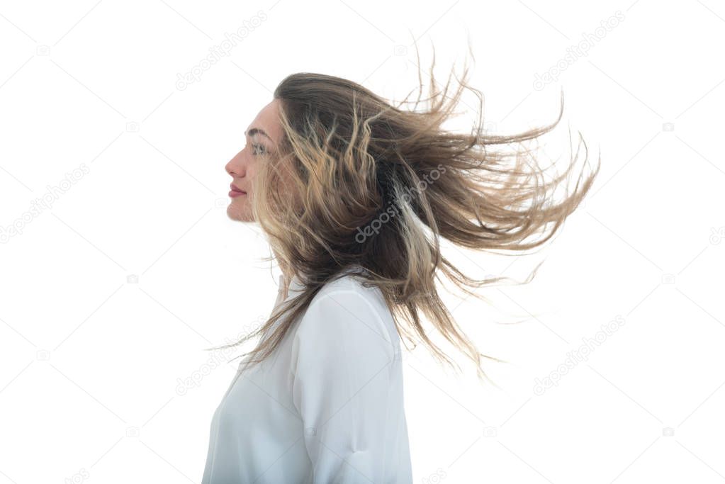 Woman with the waving hair on a white background 