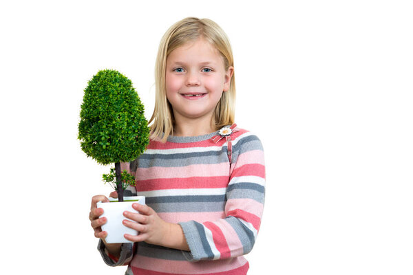 little girl holding a plant. white background