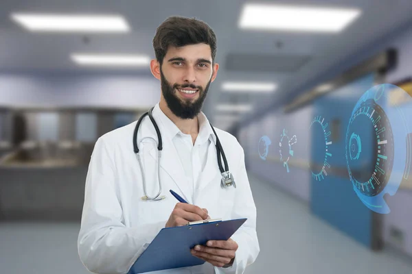 Happy young doctor with beard