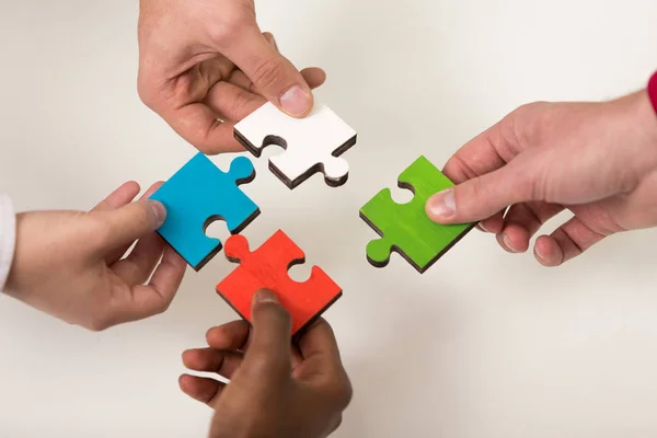 Mensen uit het bedrijfsleven groep montage jigsaw puzzel — Stockfoto