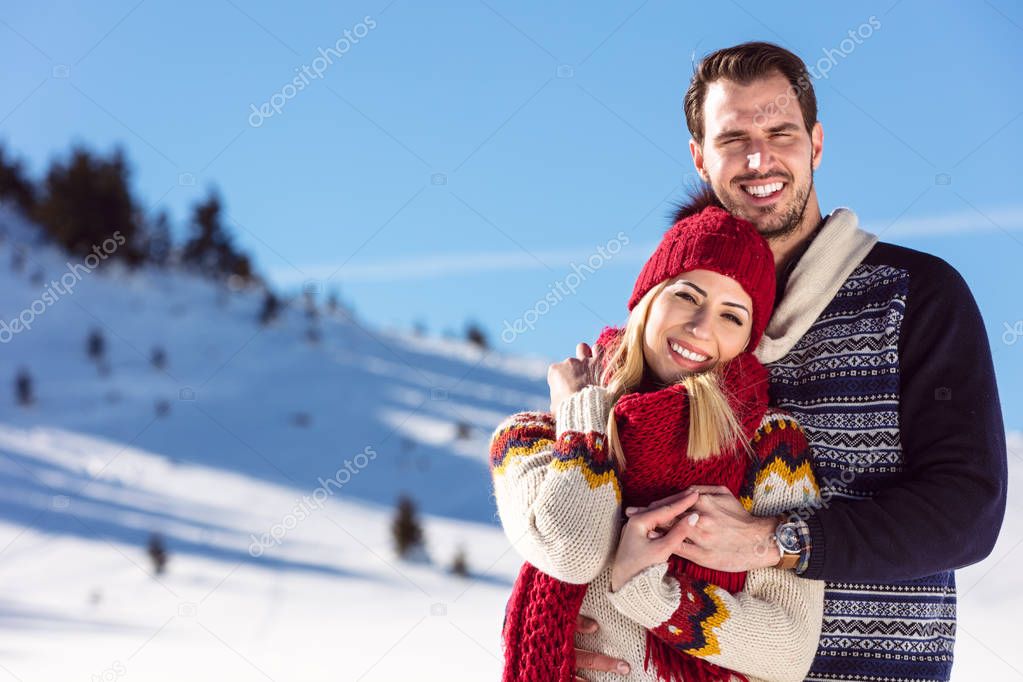 Couple Having Fun on snow 