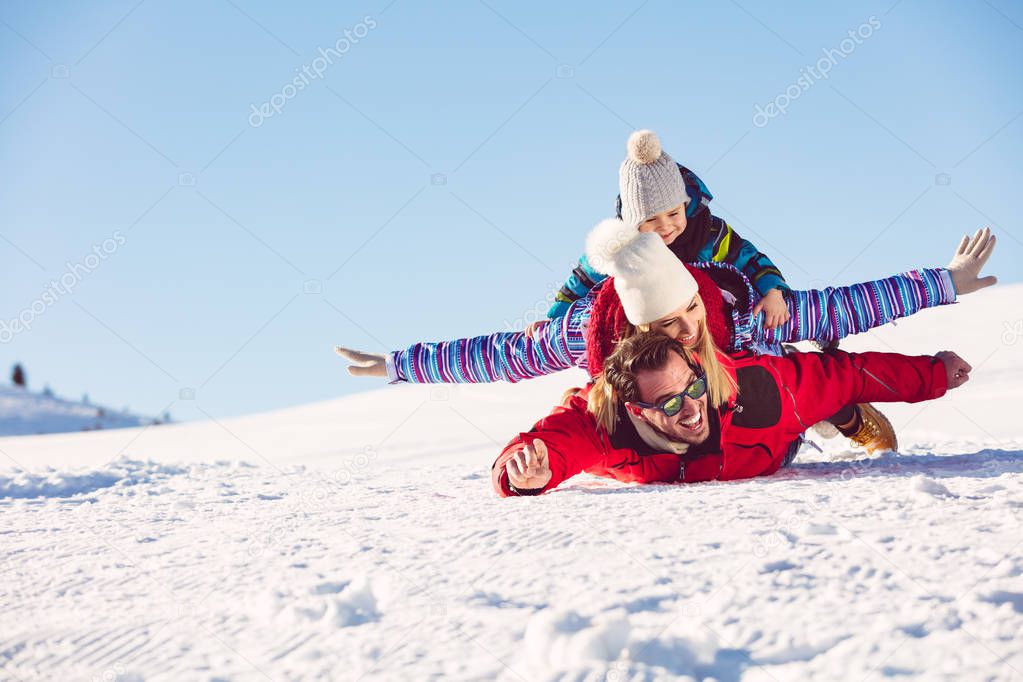 happy family on ski holiday