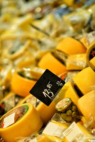 Italian hard cheese with  olives — Stock Photo, Image