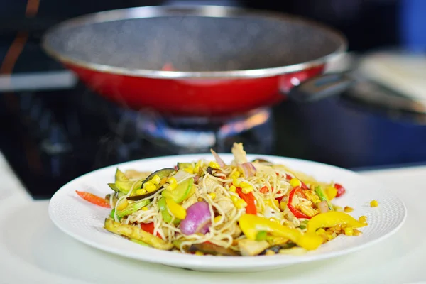 Pasta with vegetables on table — Stock Photo, Image