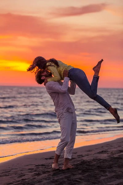 Couple having fun on coast — Stock Photo, Image