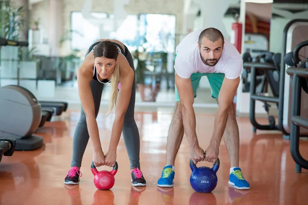 People working out at gym — Stock Photo, Image
