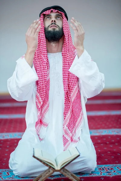 Muslim Arabic man praying