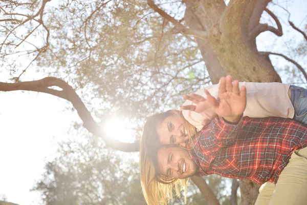 Couple relax under the tree. Fine art style. Olive garden. — Stock Photo, Image