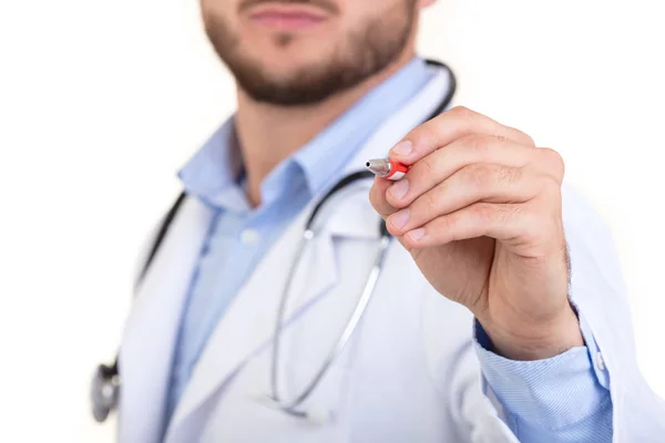 Mano del doctor con un bolígrafo apuntando blanco — Foto de Stock