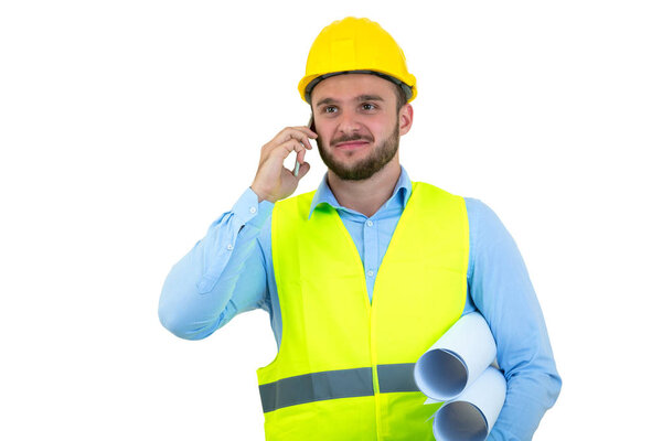 Angry upset young construction engineer yeling at the phone