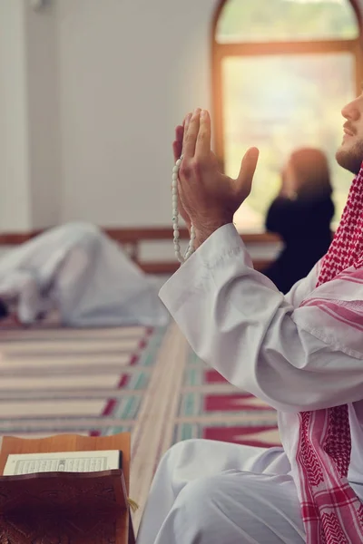 Religious muslim man praying inside the mosque — Stock Photo, Image