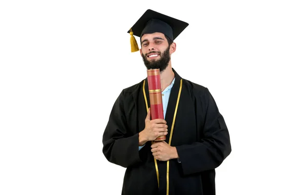 Веселый улыбающийся мужчина выпускник носить платье и кепку изолированы на белом — стоковое фото