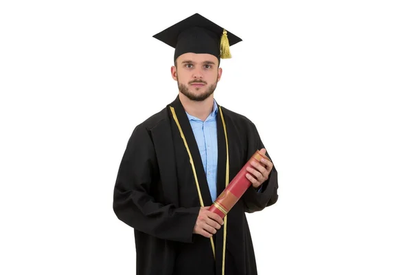 Wesoły uśmiechnięty mężczyzna absolwent noszenia sukni i cap na białym tle — Zdjęcie stockowe
