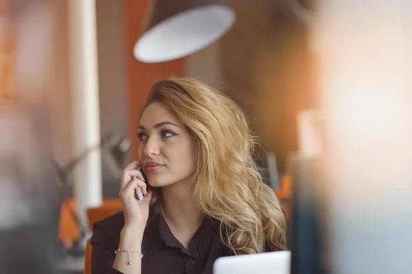 Portrait of cheerful employer of business enterprise enjoying creative working process in modern office indoors — Stock Photo, Image