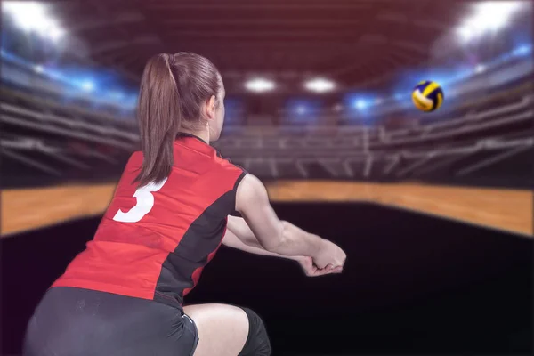 Female professional volleyball player on volleyball court — Stock Photo, Image