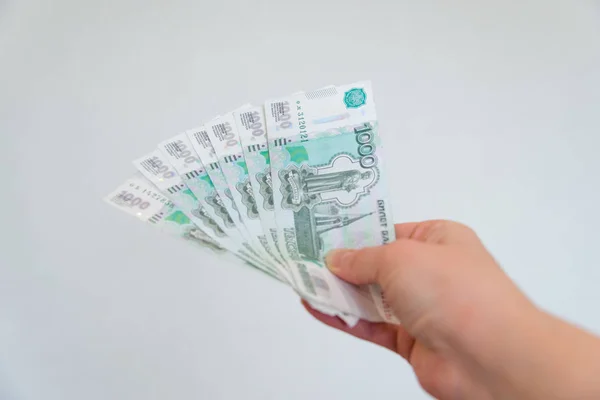 A woman's hand holds a five thousandth note. Russian money. — Stock Photo, Image