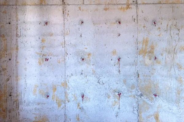 Tasarım için doku veya arkaplan olarak koyu gri çimento veya beton duvar