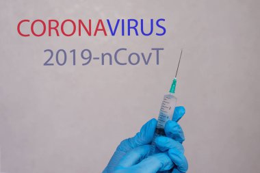 Solunum maskeli ve eldivenli bir hemşire Çin 'de koronavirüse karşı bir aşı üretiyor. Coronavirus Karantinası kavramı. Orta Doğu Solunum Sendromu Coronavirüs 2019