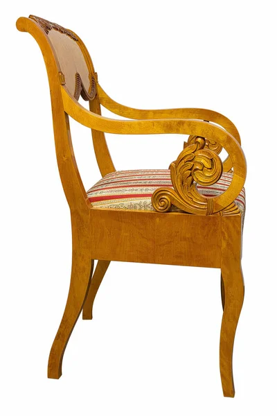 Антикварное кресло в стиле бидермайер с подлинной тканью и резьбой по дереву — стоковое фото