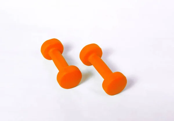 Dos Mancuernas Color Naranja Para Aptitud Cubre Con Material Suave —  Fotos de Stock