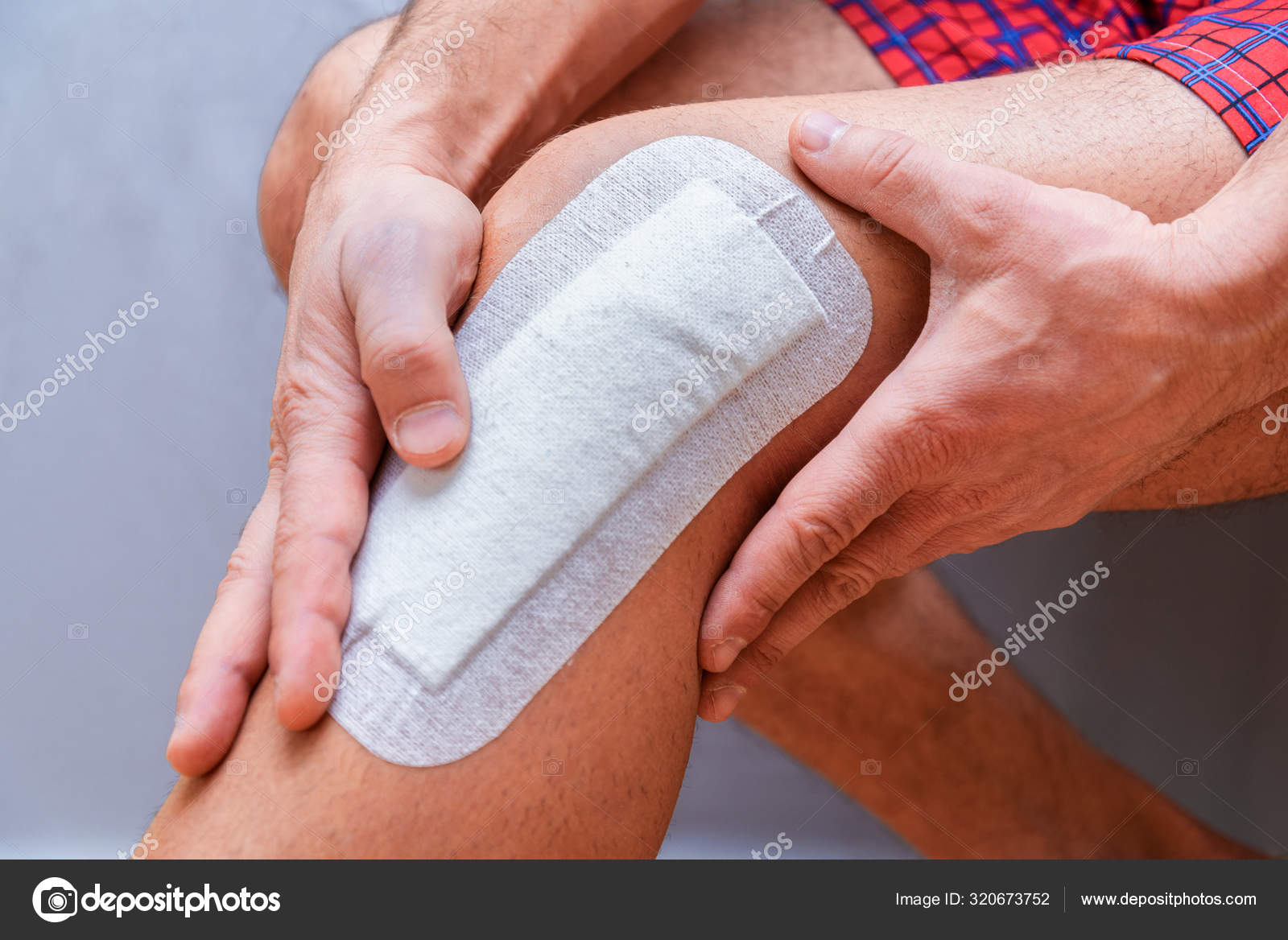 Medical Plaster Glued Knee Male Leg Surgery Stock Photo by ©valery161