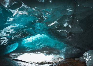 patterns on the ice ceiling inside the glacial cave of the Alibek mountain glacier