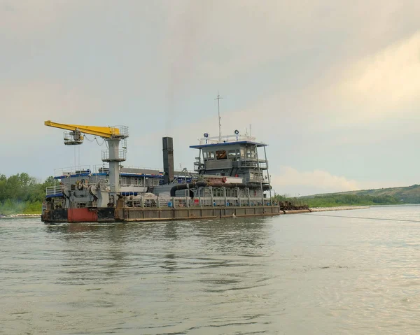 industrial vessel for bottom cleaning works on the river