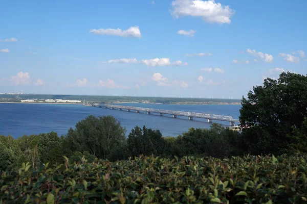 Beautiful summer landscape. River View. The long bridge over the river. Nature. Russia.