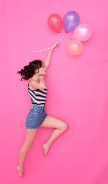 Menina com balões coloridos . — Fotografia de Stock