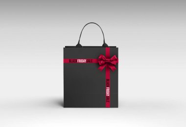Black Friday Shopping Concept: Black Shopping Bag On light grey 