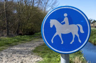 Sign indicating bridle path in the netherlands clipart