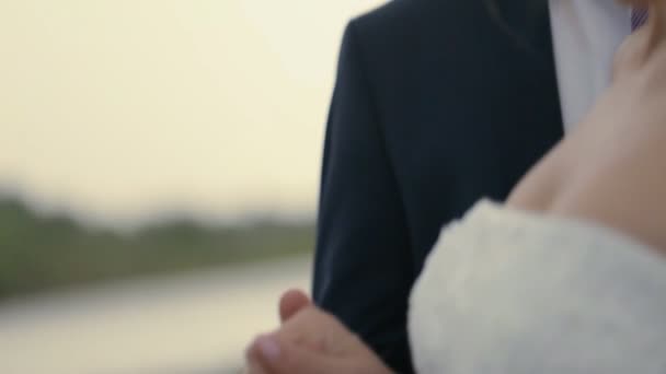 Beautifull bride close up near the river — Stock Video