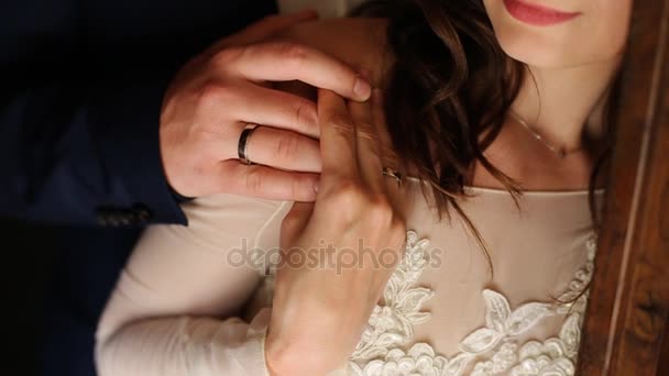 Close up groom gently embraces the brides shoulder — Stock Video