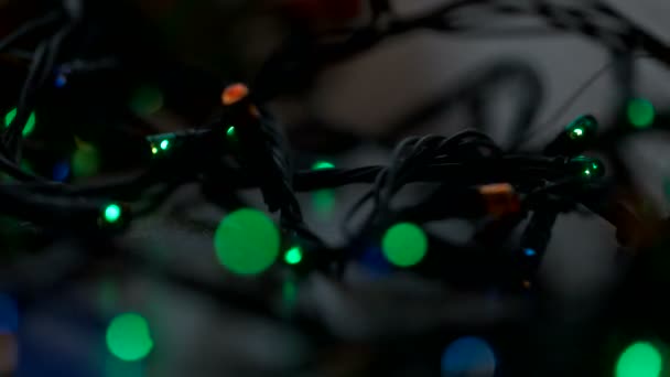 Christmas garland lightbulbs. Bokeh effect. Christmas and New Yaer decoration. Close up — Stock Video