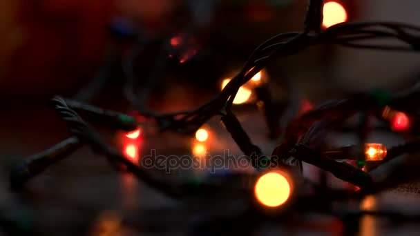 Christmas garland lights. Bokeh. Christmas and New Yaer decoration. Close up — Stock Video