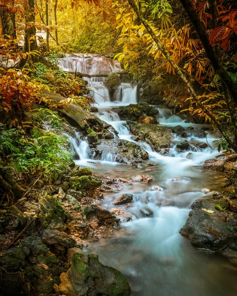 Waterfall in deep tropical jungle in autumn. — Stock Photo, Image